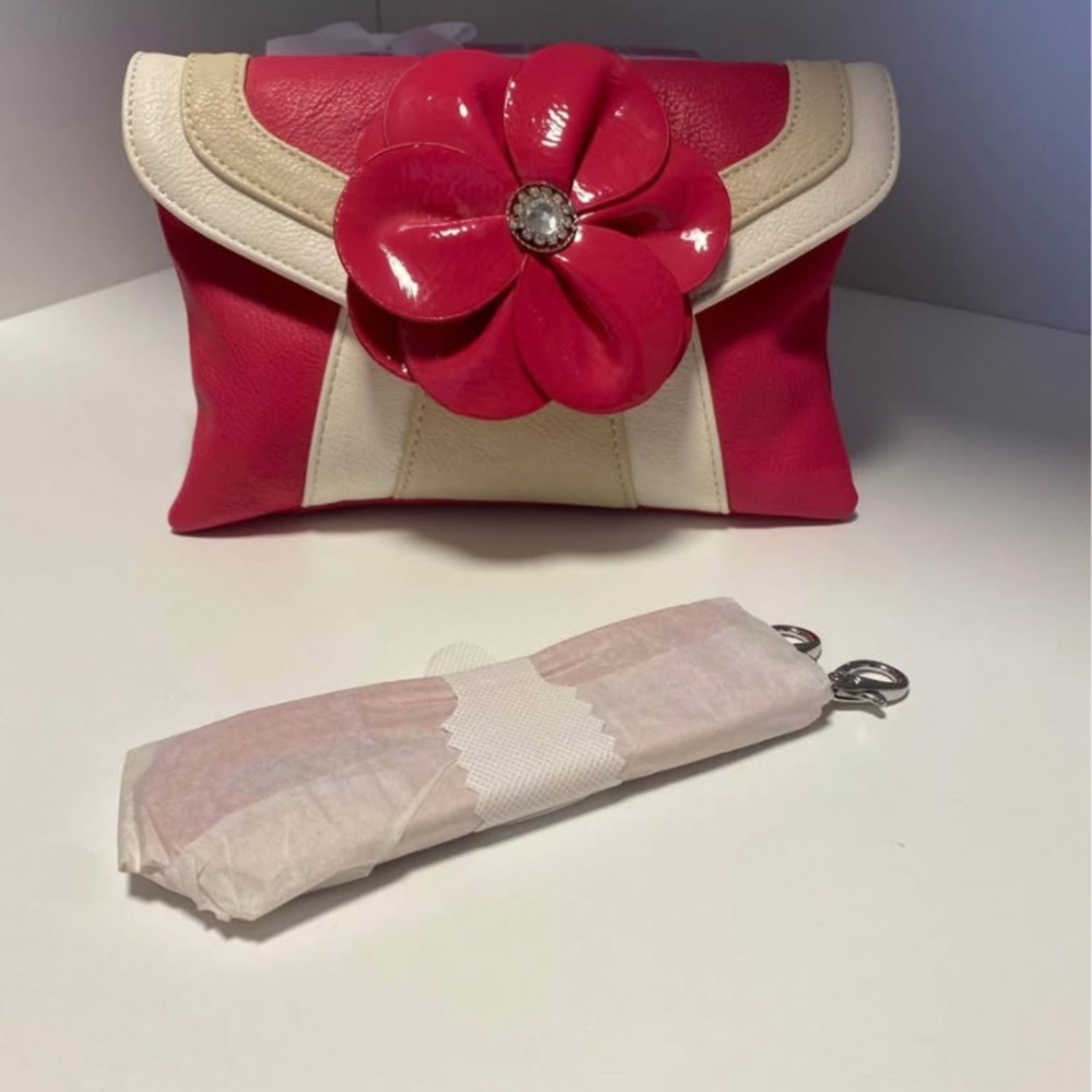NWOT -- Grace Adele Pink and Cream Clutch with Floral Detail